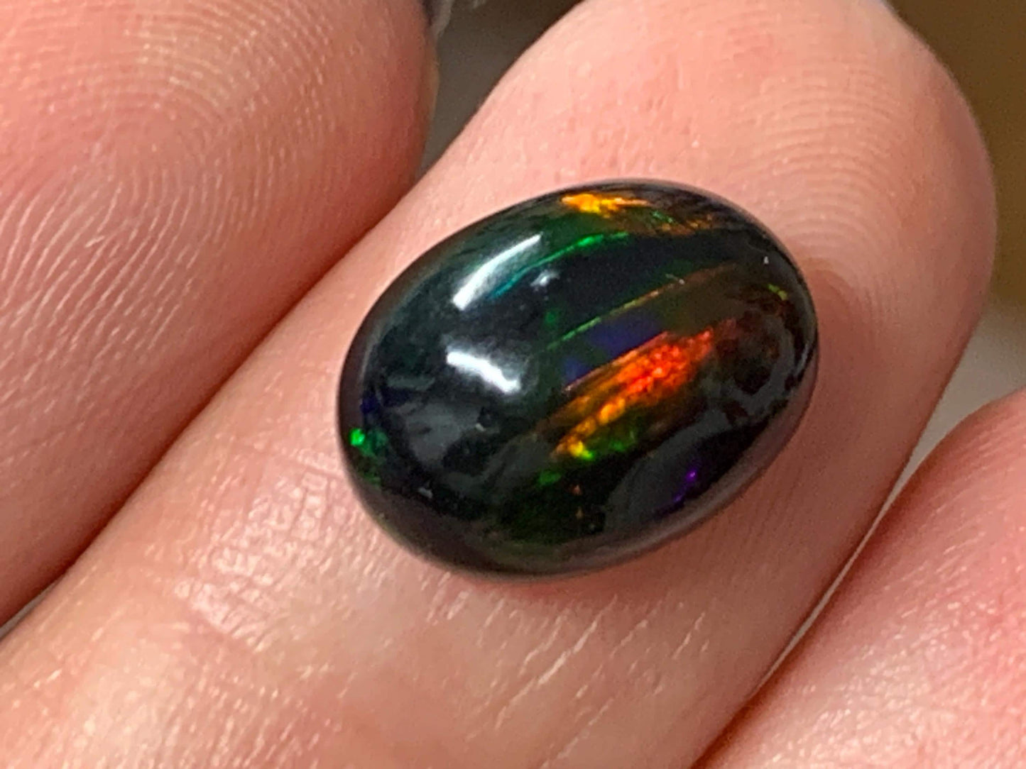 Natural Ethiopian Black Opal 9x12x5mm cabochon