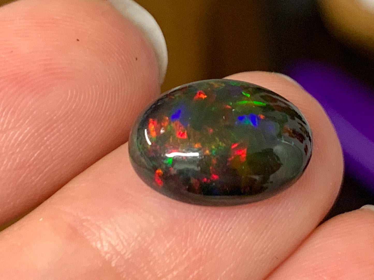 Natural Ethiopian Black Opal 10x13x5mm cabochon