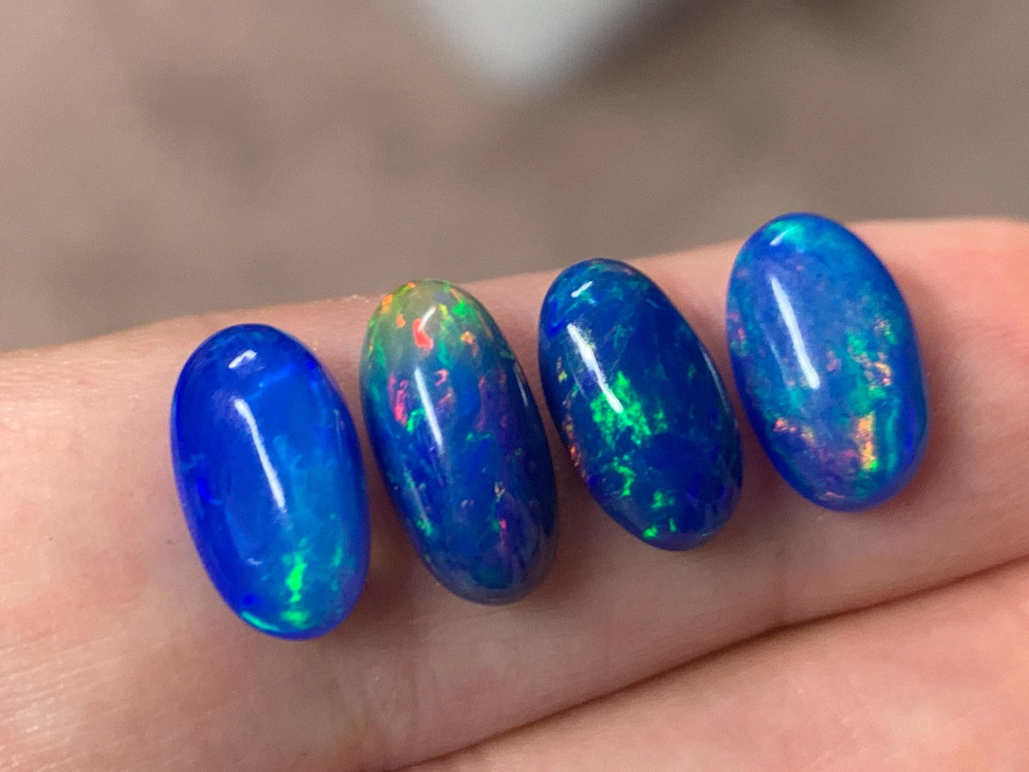 Ethiopian Opal oval 11-12mm long cabochon - Natural Opal smoked to blue color
