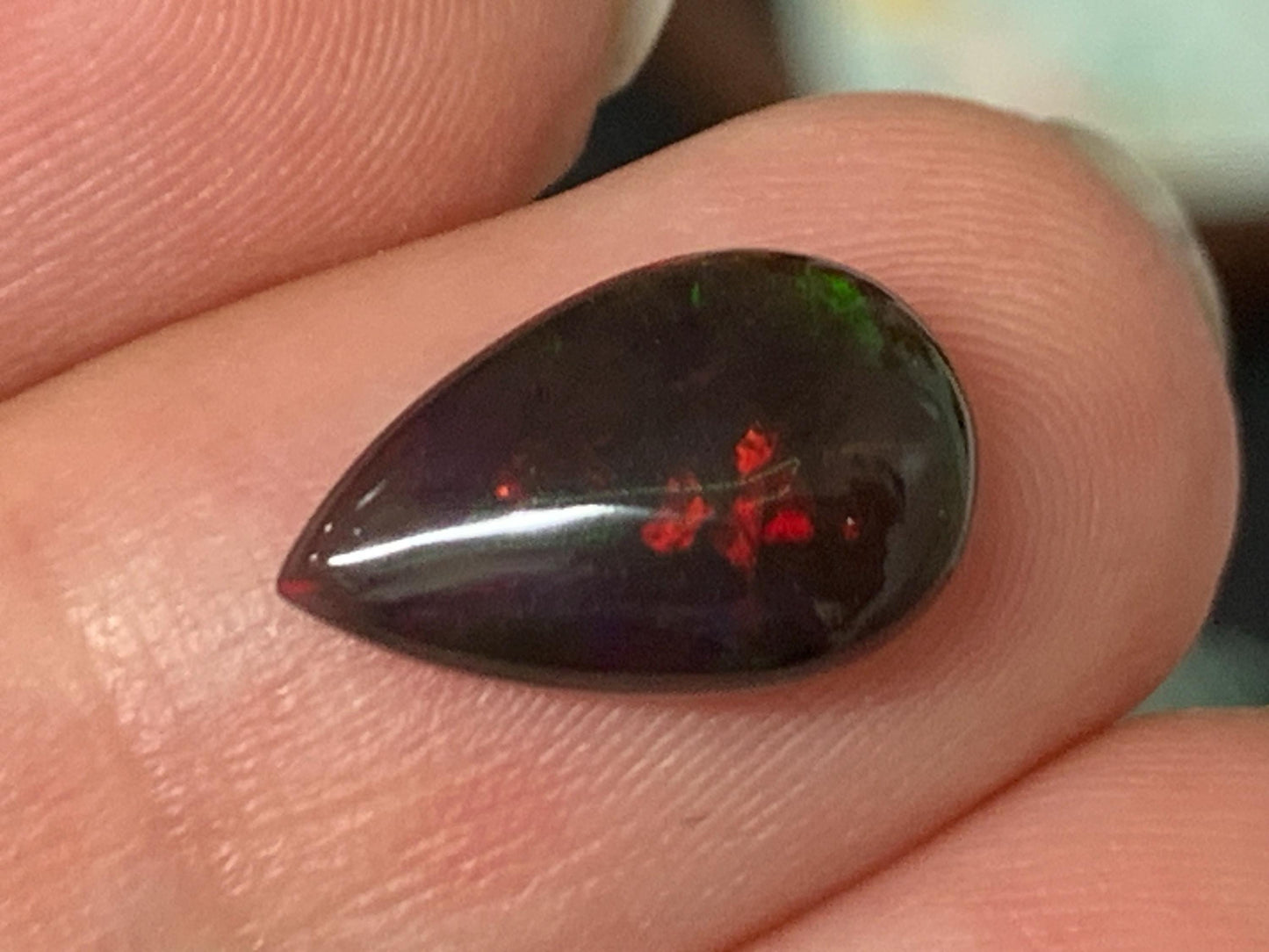Natural Ethiopian Black Opal 8x13x4mm cabochon