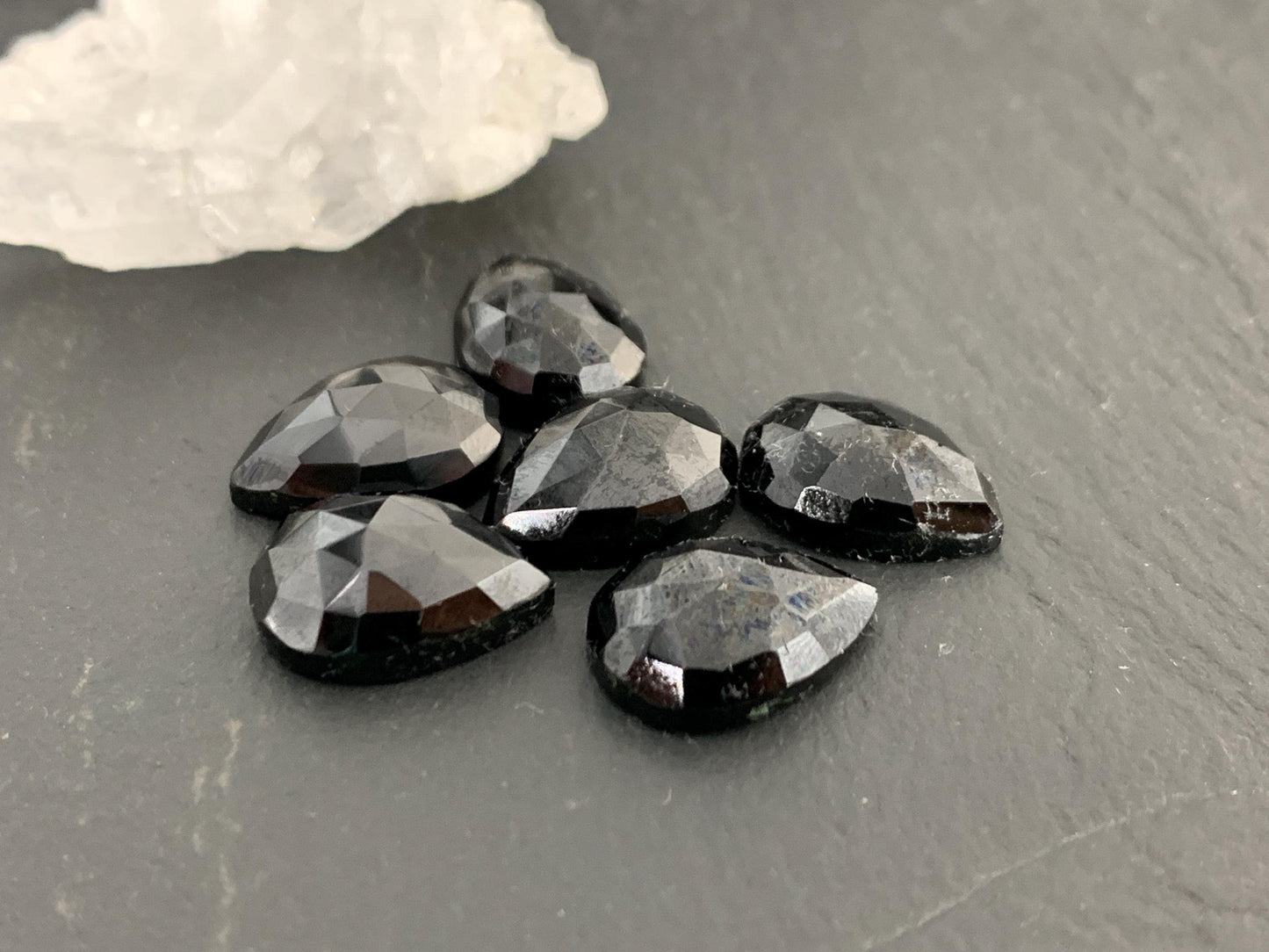 Faceted Black Spinel pear 10x14mm cabochon