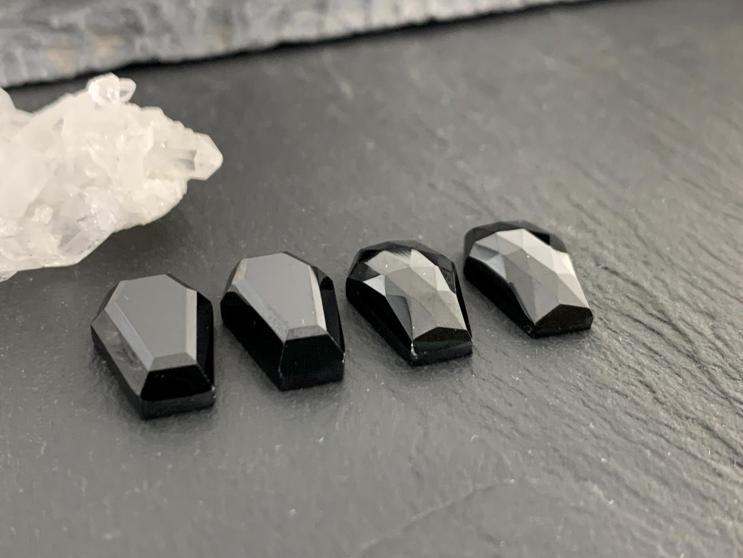 Faceted Black Spinel coffin 10x16mm cabochon