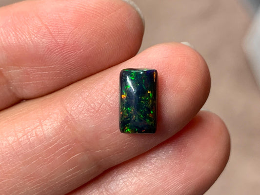 Black Ethiopian Opal rectangle 6x10x3mm cabochon