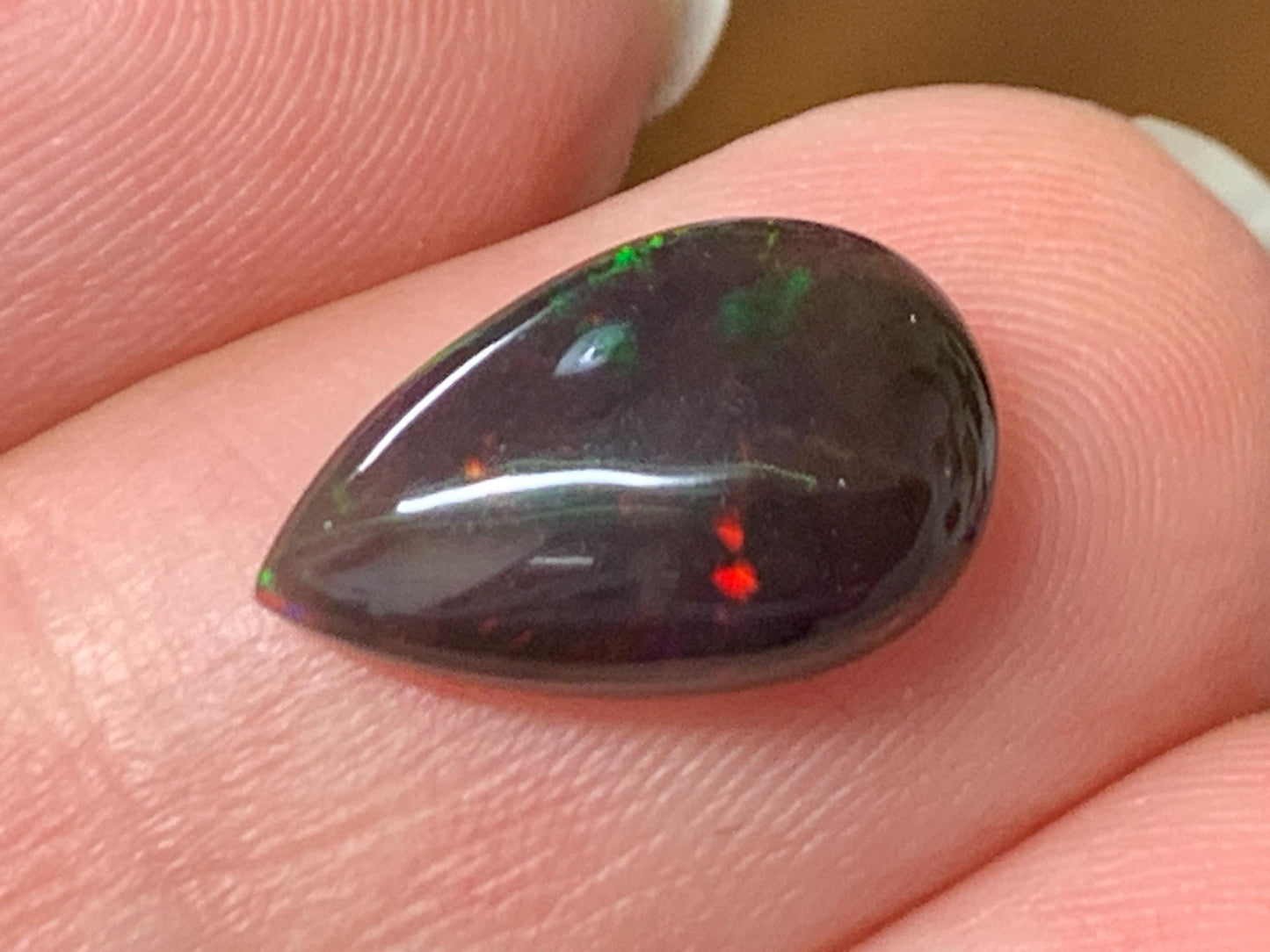 Natural Ethiopian Black Opal 8x13x4mm cabochon