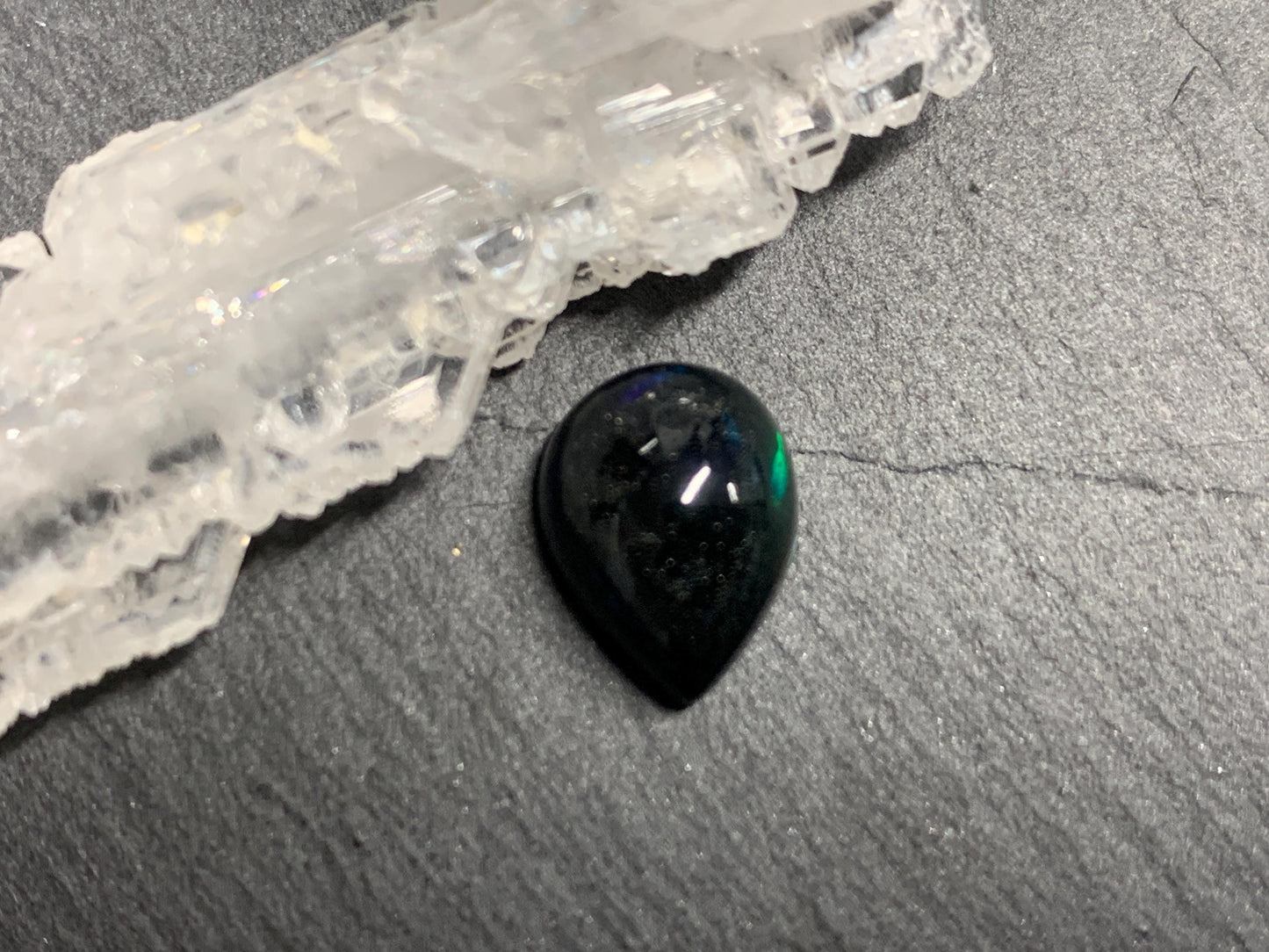 Natural Black Ethiopian Opal pear 9x12x6mm cabochon