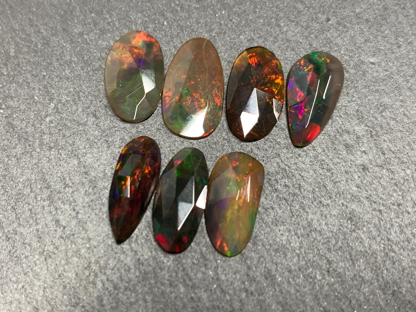 Faceted Black Ethiopian Opal 11-12mm long cabochon