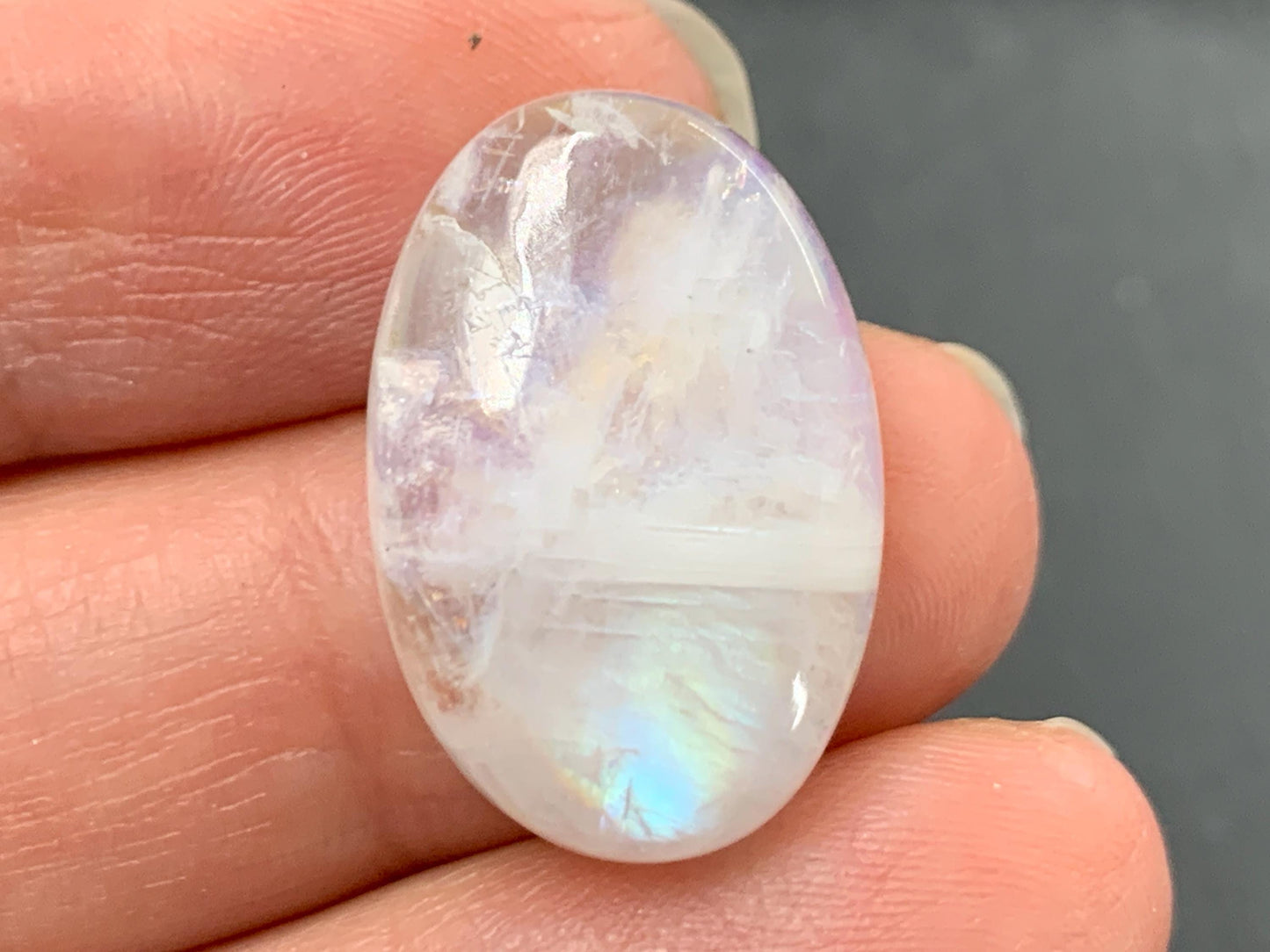 Rainbow Moonstone oval 23x16x6mm cabochon