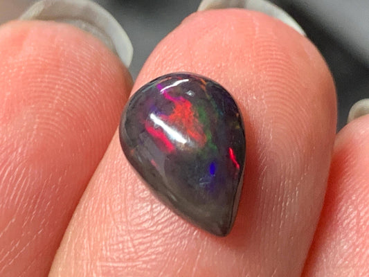 Natural Ethiopian Black Opal 7x11x4mm cabochon