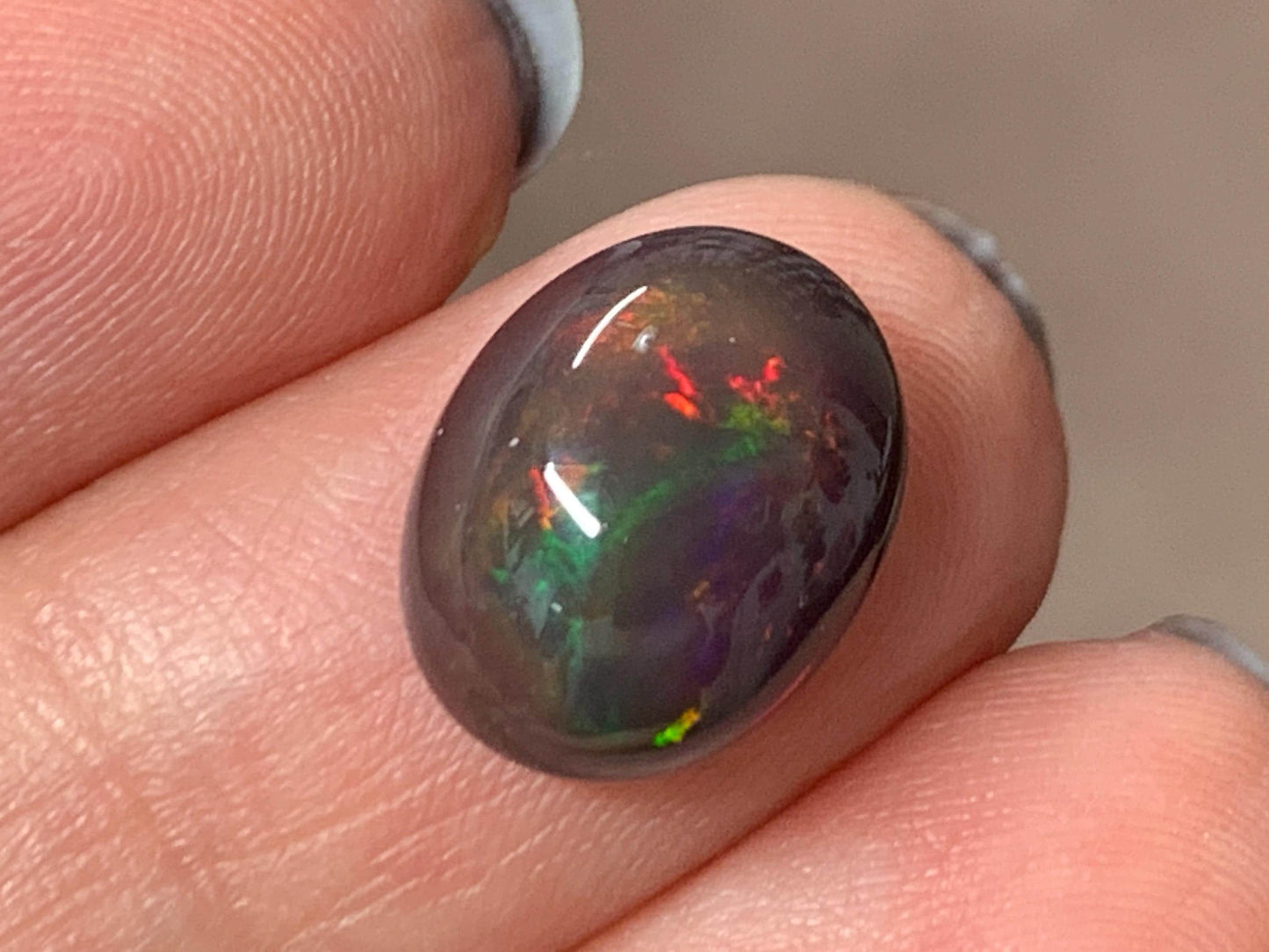 Natural Ethiopian Black Opal 10x13x5mm cabochon