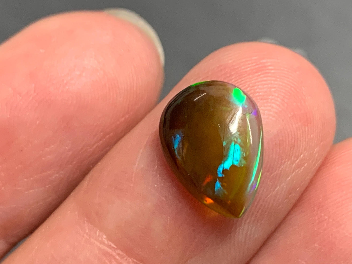 Natural Black Ethiopian Opal pear 9x12x3mm cabochon