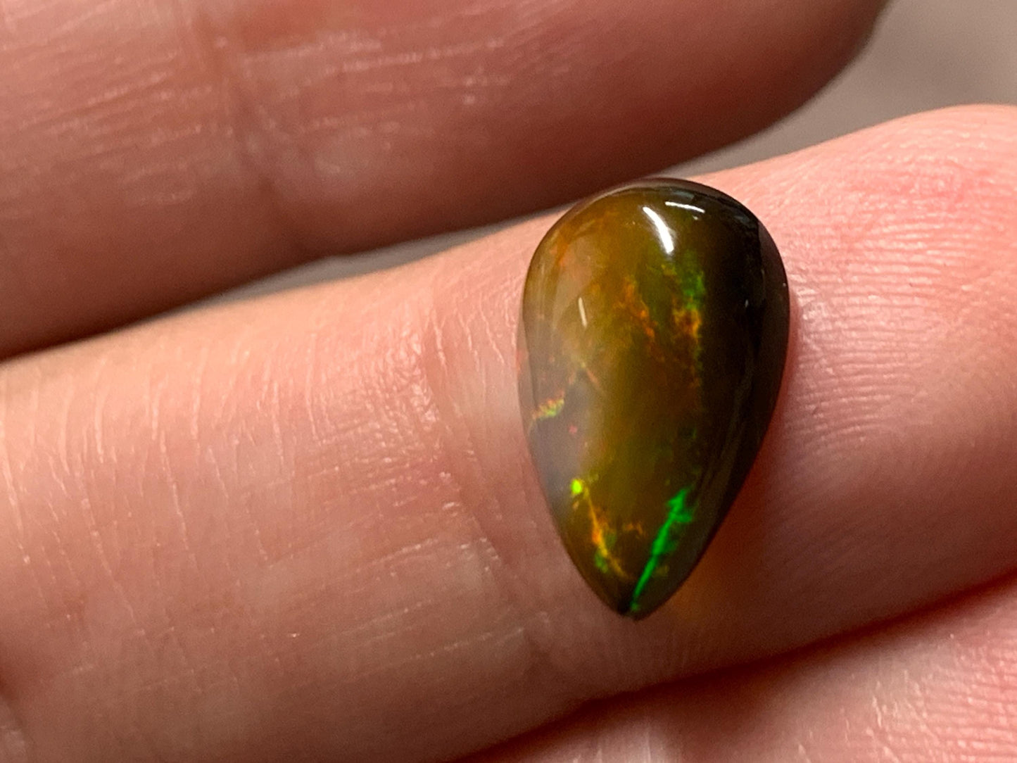 Natural Black Ethiopian Opal pear 8x13x4mm cabochon