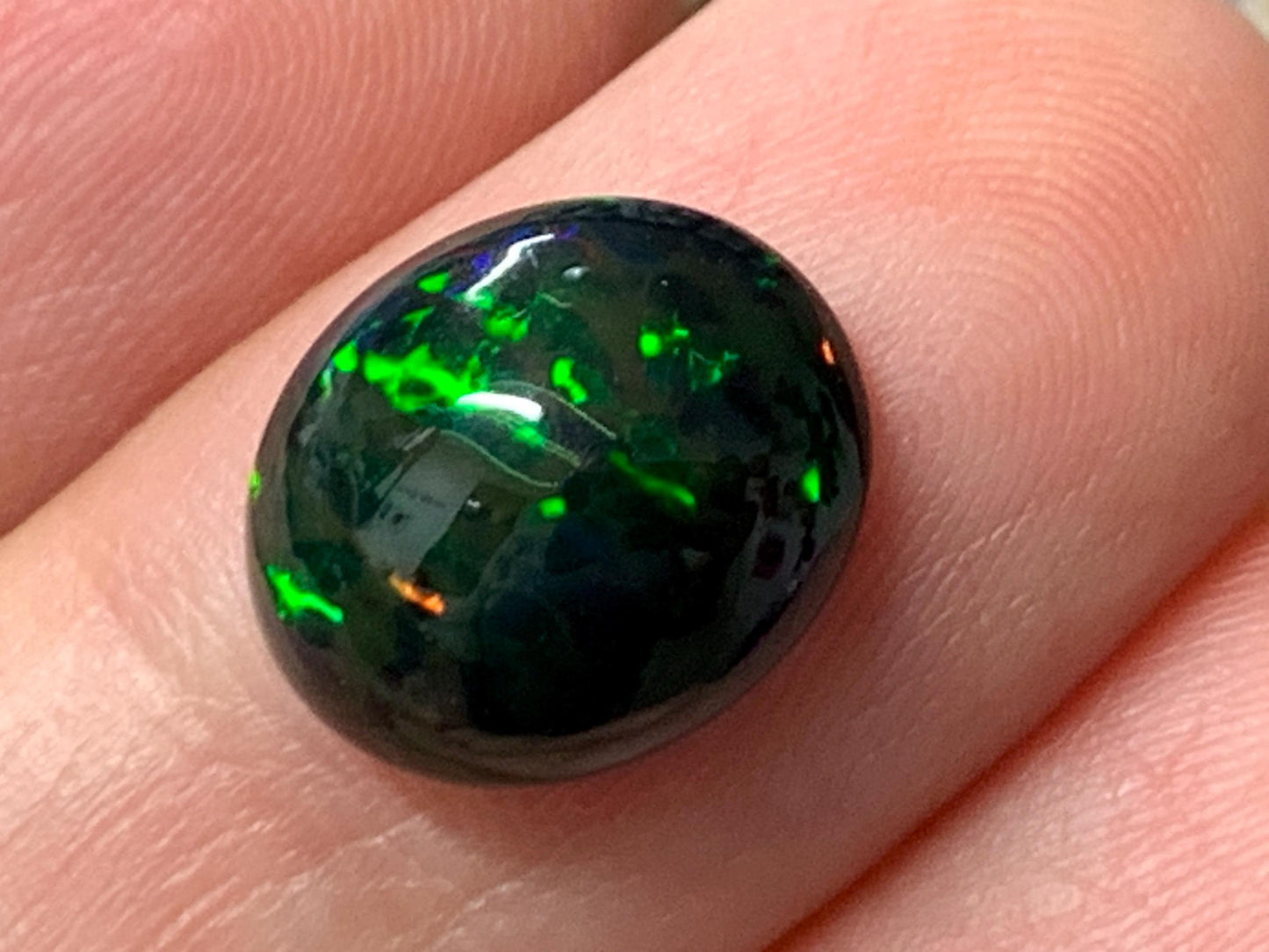 Natural Ethiopian Black Opal 10x12x4.5mm cabochon