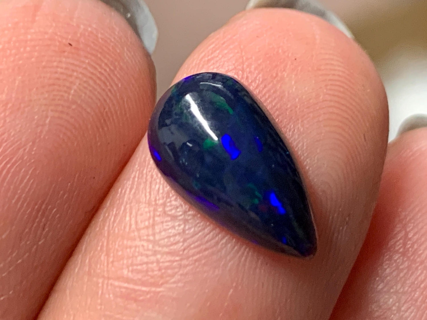 Natural Ethiopian Black Opal 7x12x4mm cabochon