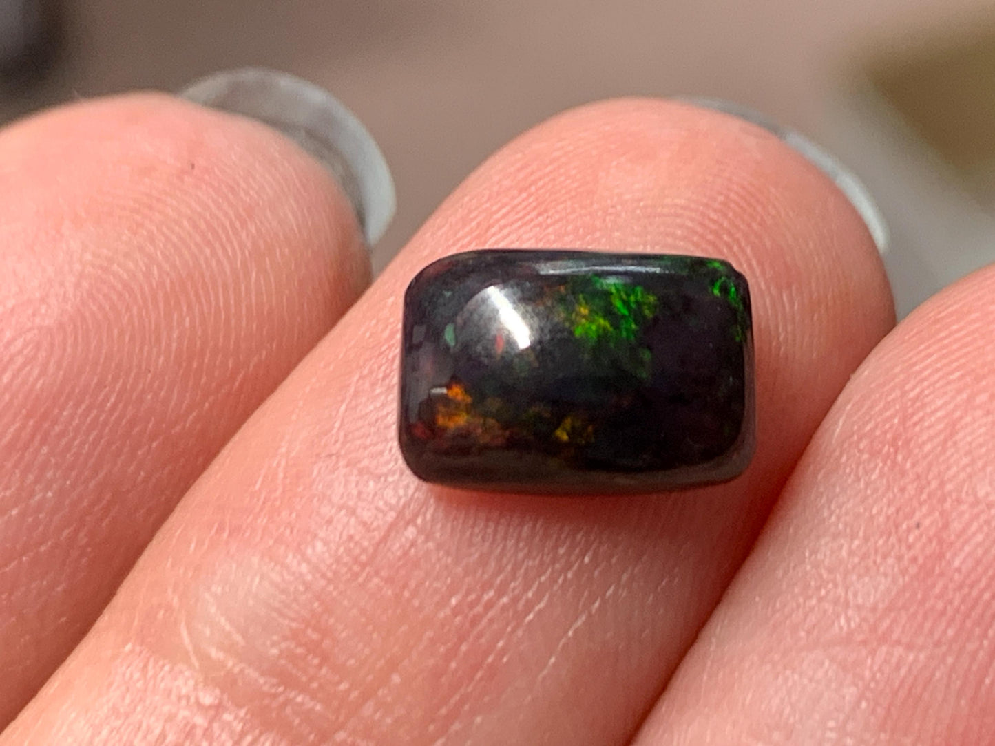 Natural Ethiopian Black Opal 6x9x3mm cabochon