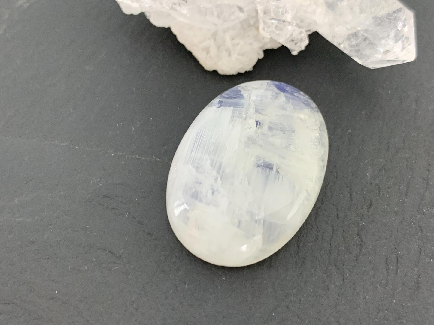 Rainbow Moonstone oval 26x19x7mm cabochon