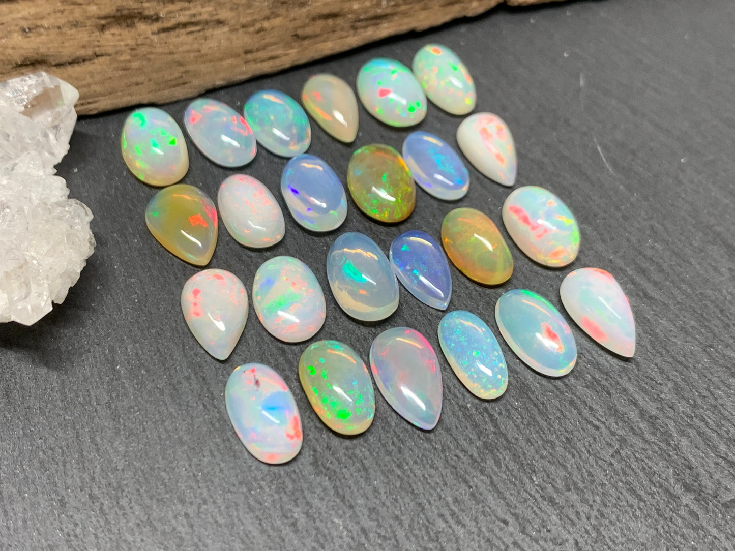 Ethiopian Opal pear, oval 11-12mm long cabochon