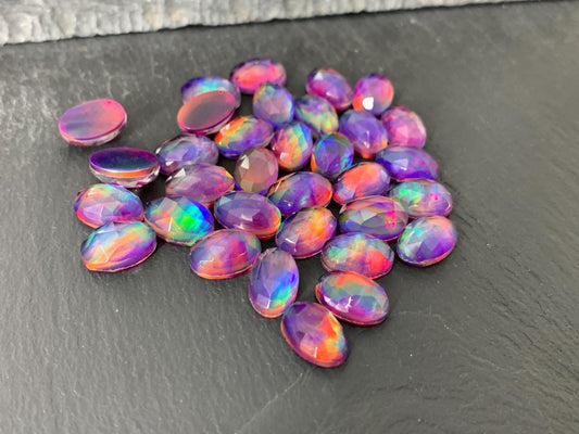 Faceted Aurora Opal oval 8x12mm cabochon - Doublet cabochons