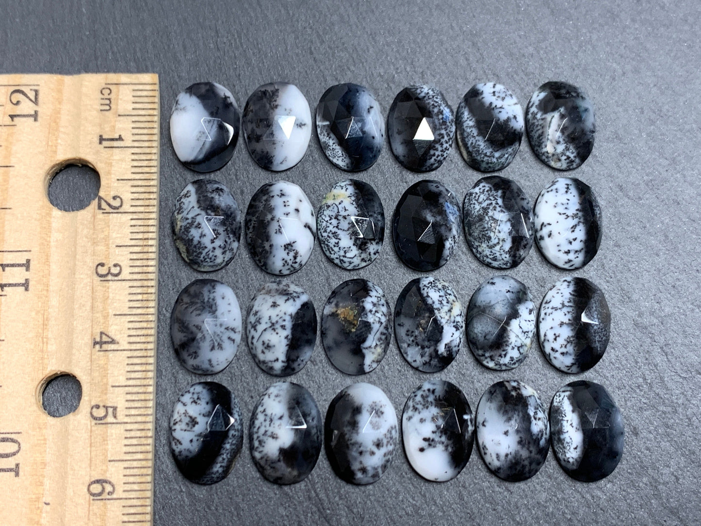 Faceted Dendrite Opal oval 10x14mm cabochon