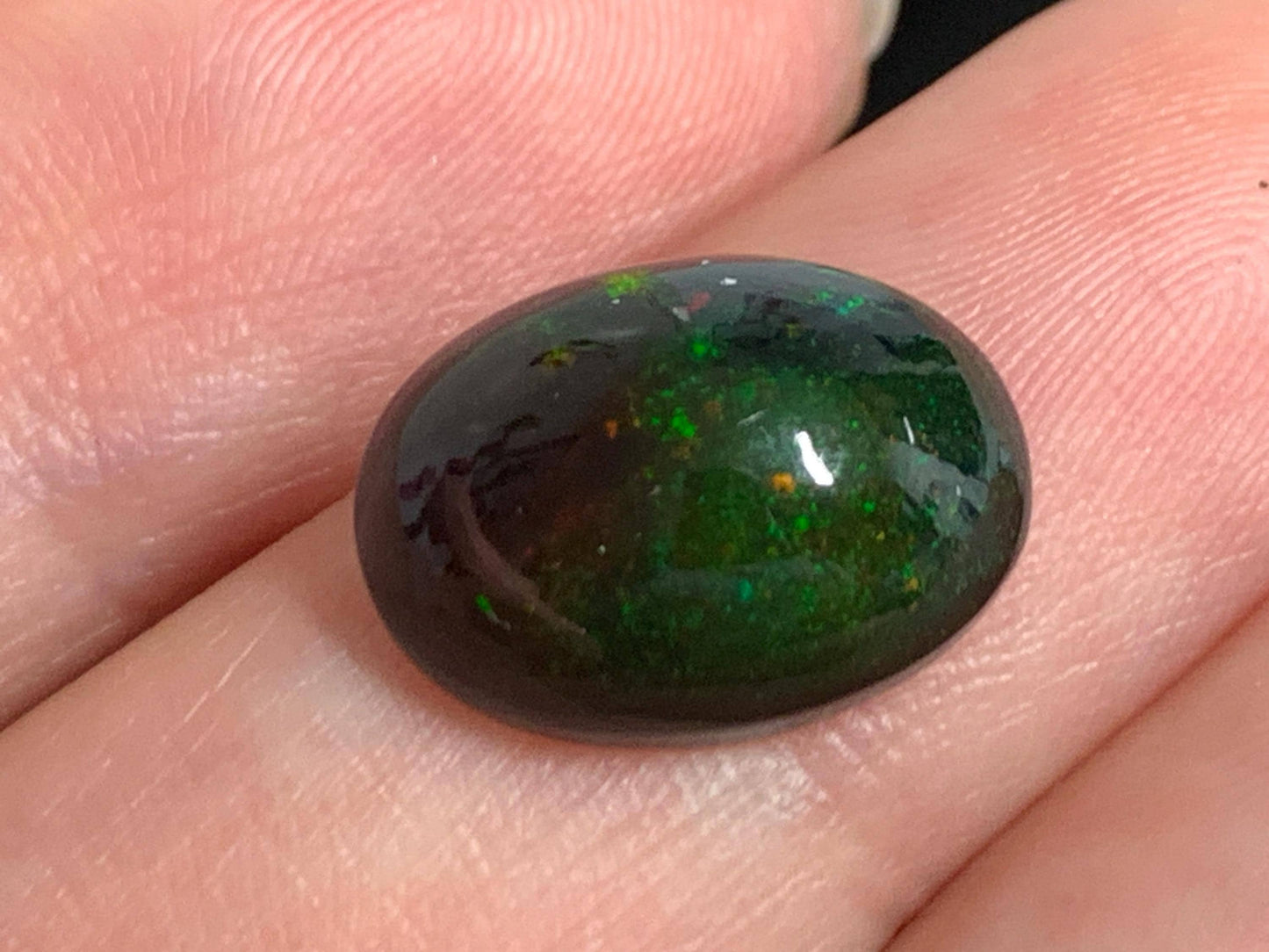 Natural Ethiopian Black Opal 10x14x6mm cabochon
