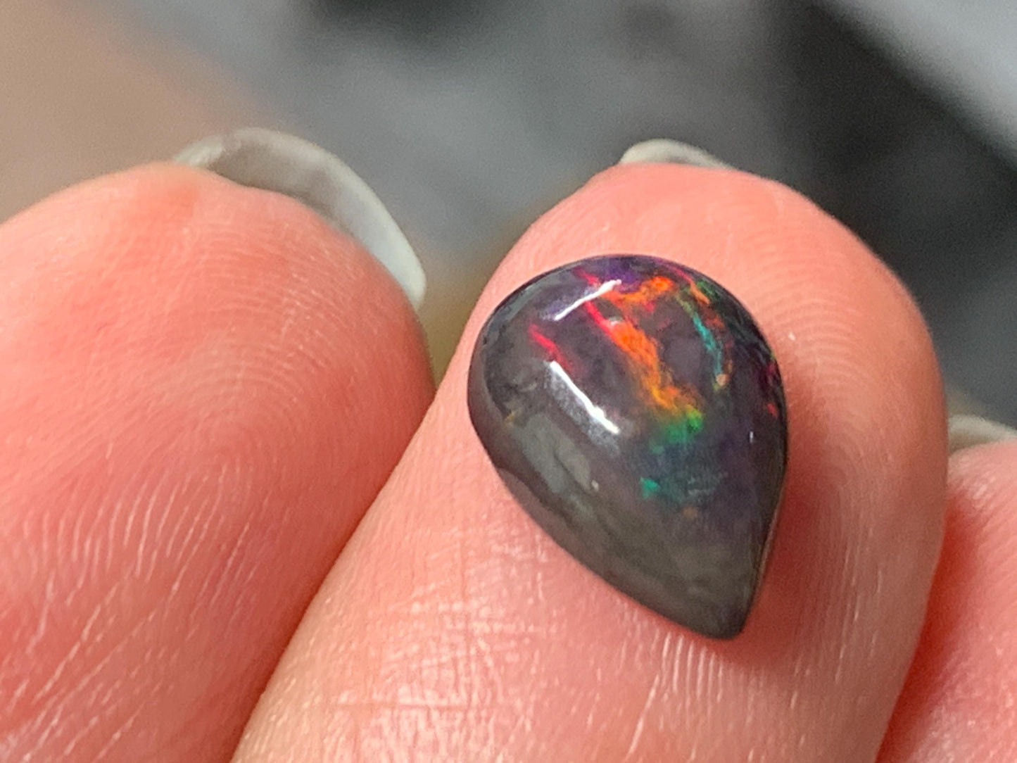 Natural Ethiopian Black Opal 7x11x4mm cabochon