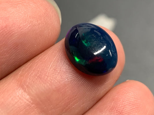 Natural Black Ethiopian Opal oval 9x11x4mm cabochon