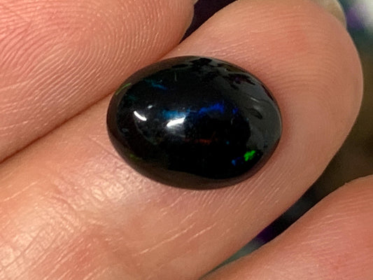 Natural Ethiopian Black Opal 9x12x5mm cabochon