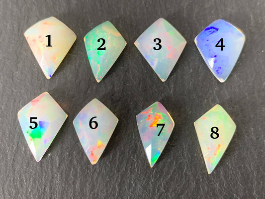 Faceted Ethiopian Opal kite 13mm long cabochon
