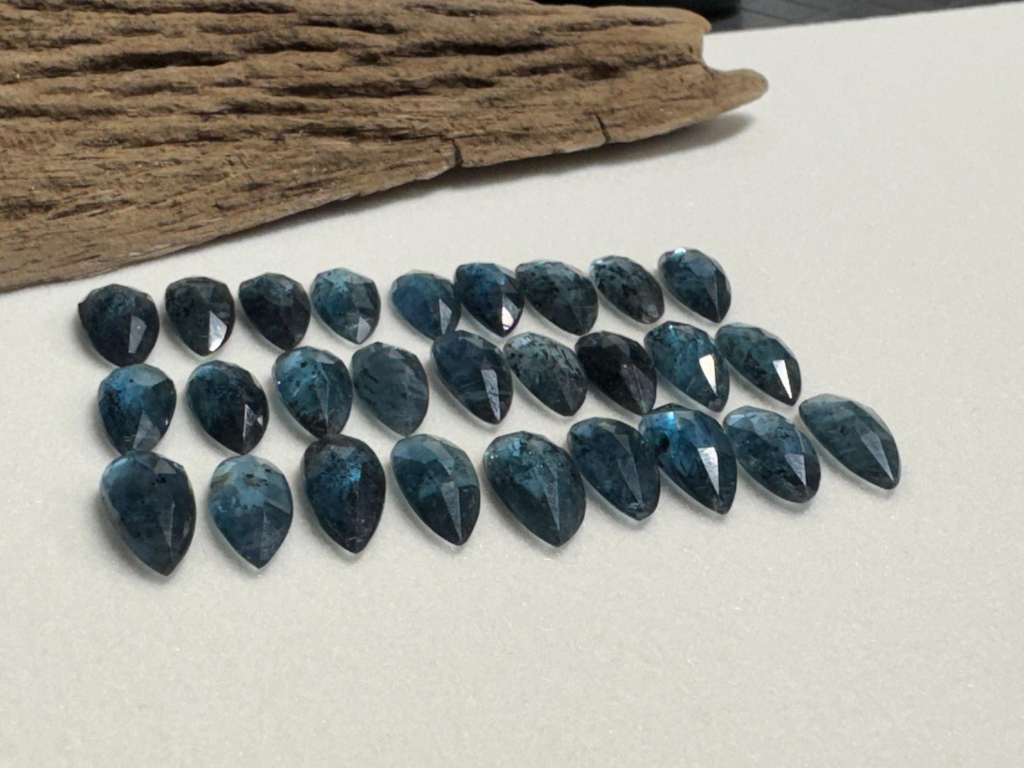 Faceted Moss Kyanite pear 7x15mm cabochon