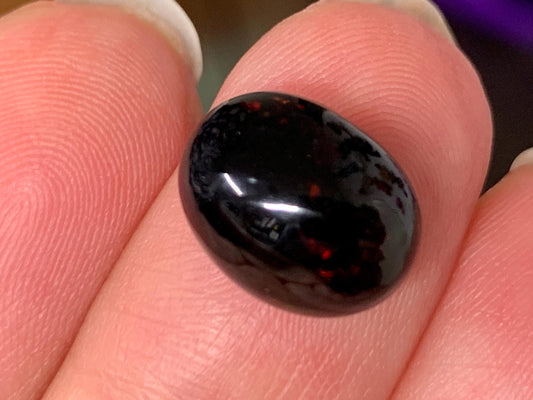 Natural Ethiopian Black Opal 9x12x7mm cabochon