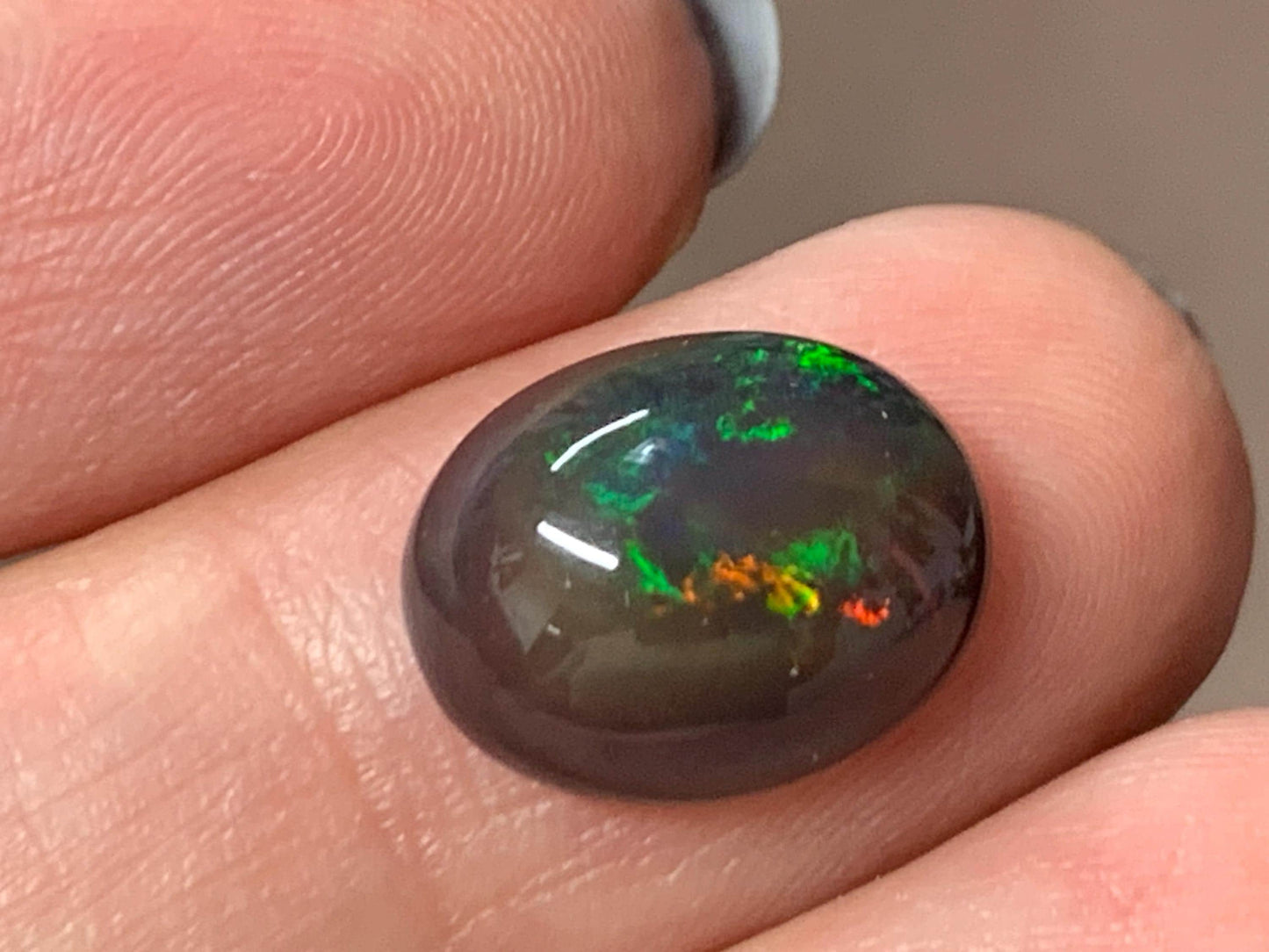 Natural Ethiopian Black Opal 10x13x5mm cabochon