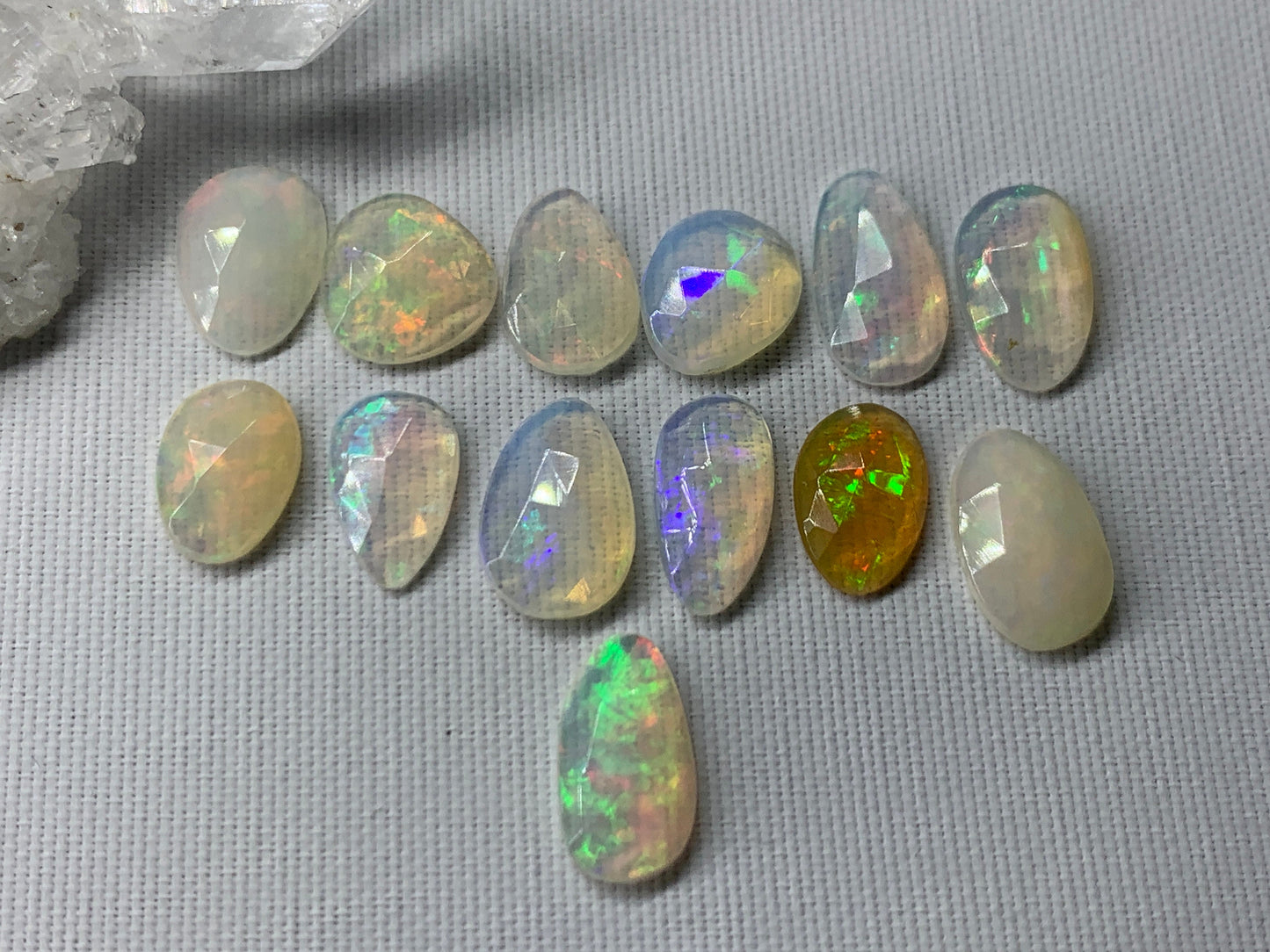 Faceted Ethiopian Opal 10-12mm long cabochon