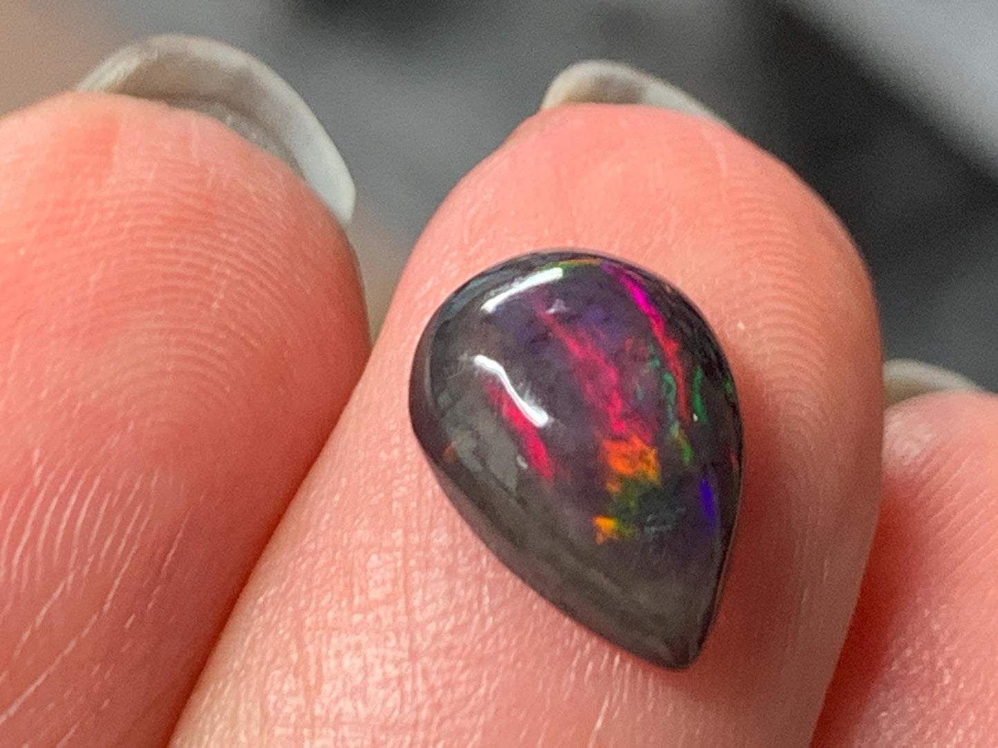 Natural Ethiopian Black Opal 7x11x4mm cabochon