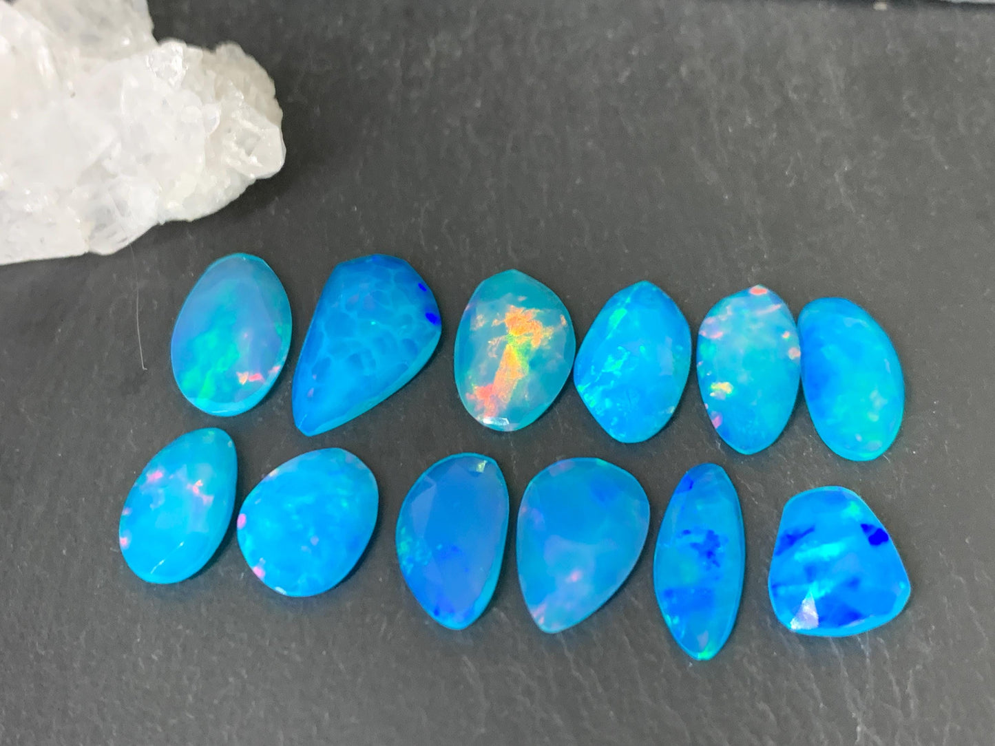 Faceted Blue Ethiopian Opal 11-16mm long cabochon