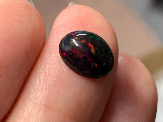 Natural Ethiopian Black Opal 8x10x4mm cabochon