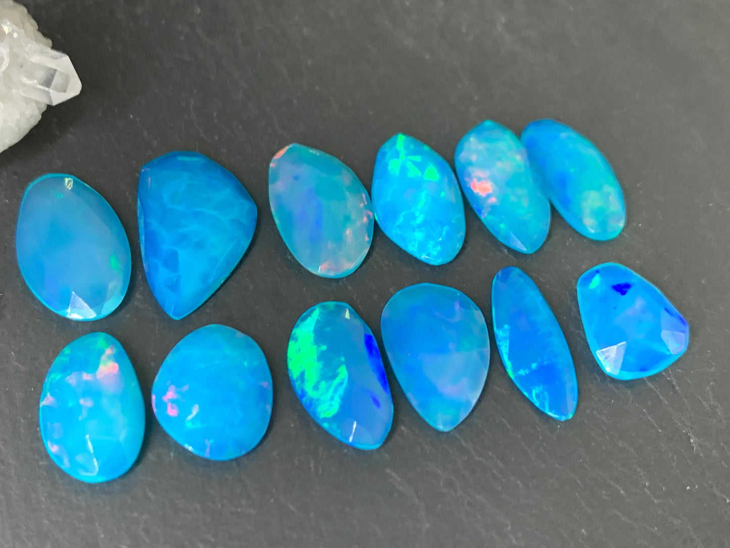 Faceted Blue Ethiopian Opal 11-16mm long cabochon