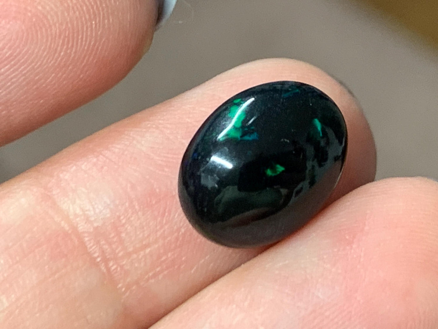 Natural Ethiopian Black Opal 10x12x5mm cabochon