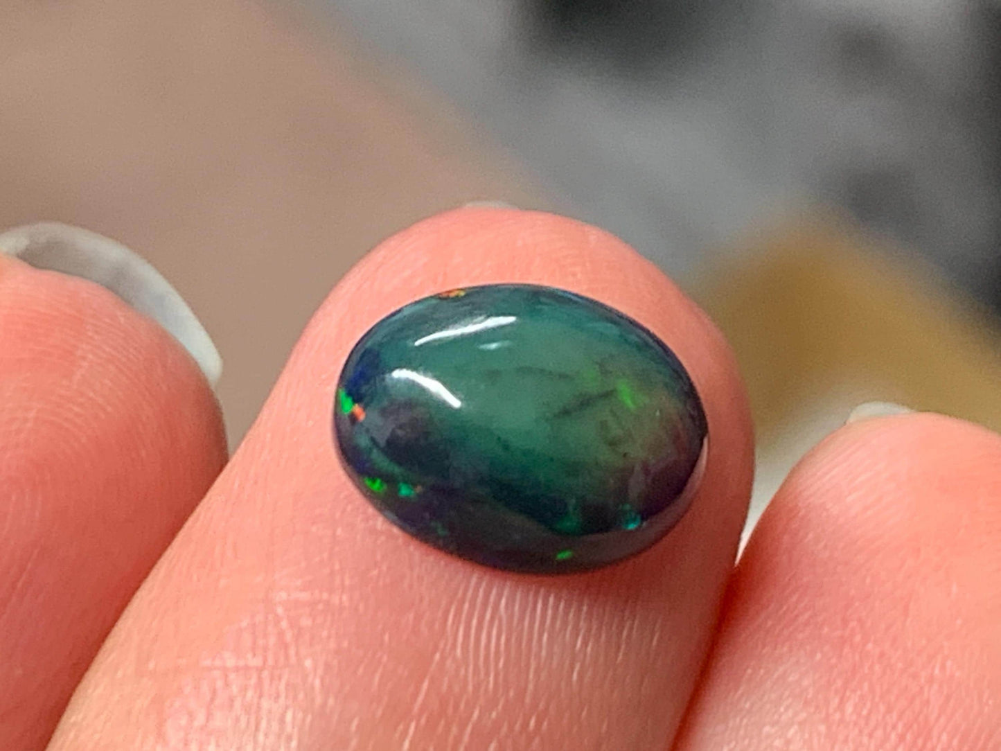 Natural Ethiopian Black Opal 8x10x4mm cabochon