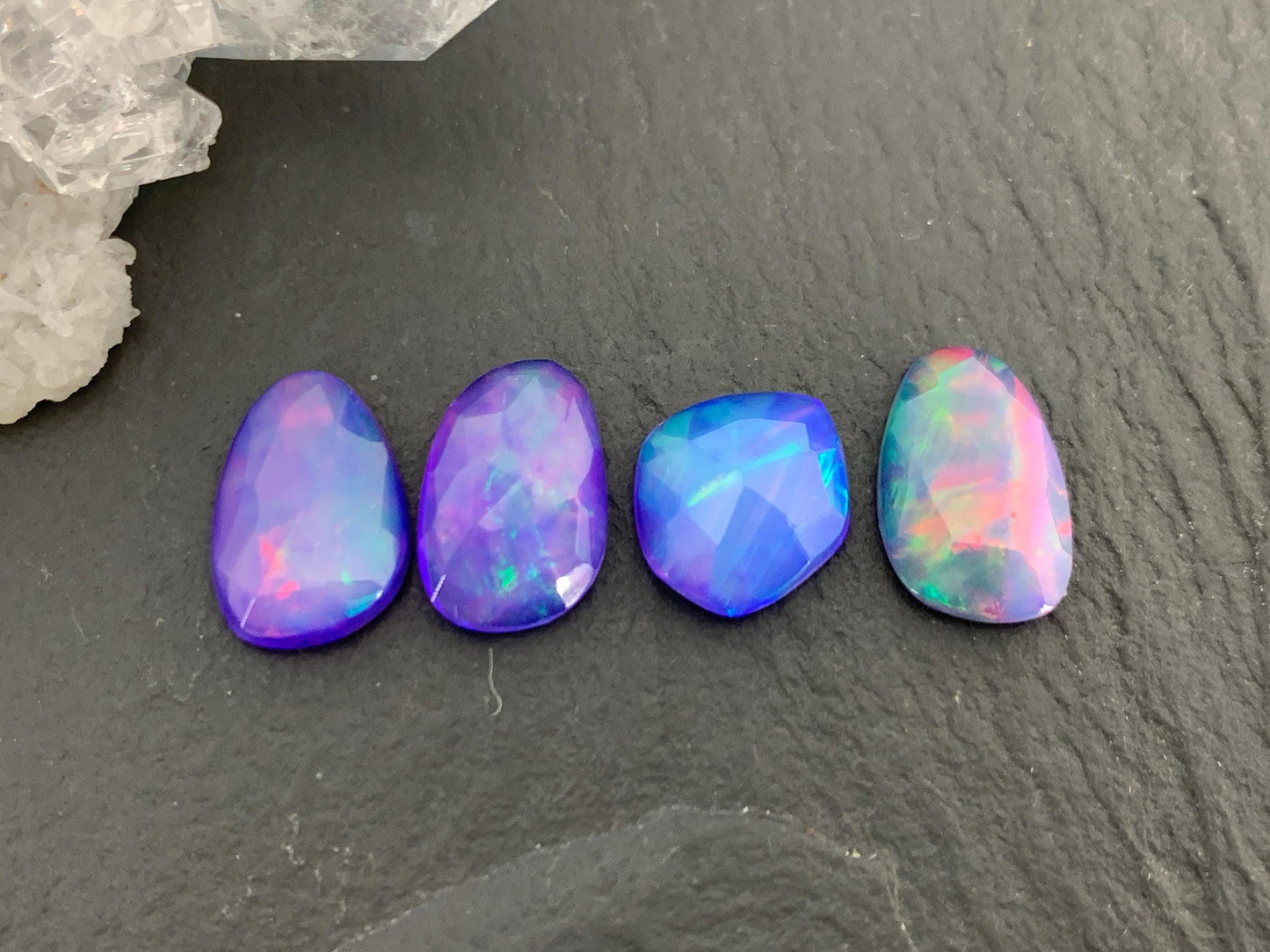 Faceted Ethiopian Purple Opal 9-11mm cabochon