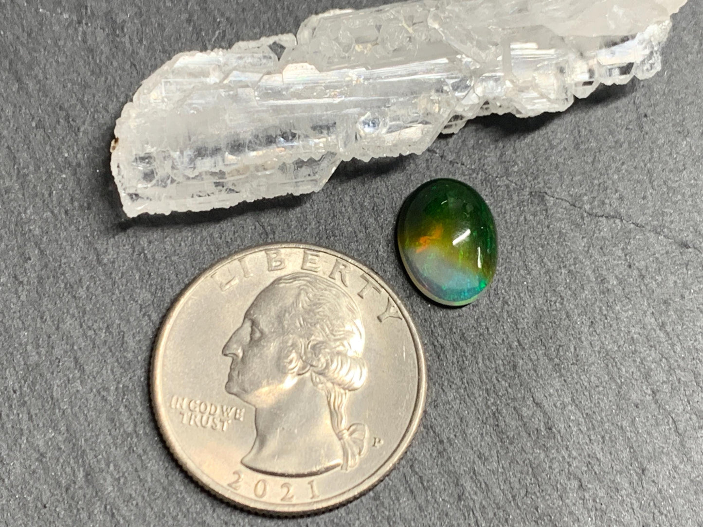 Natural Black Ethiopian Opal oval 9x11x4mm cabochon