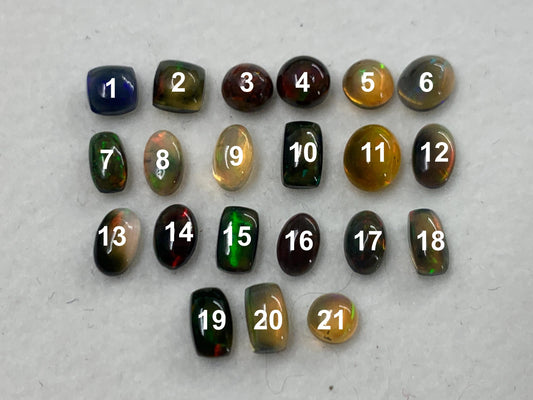 Natural Black Ethiopian Opal oval 4-5mm long cabochon *