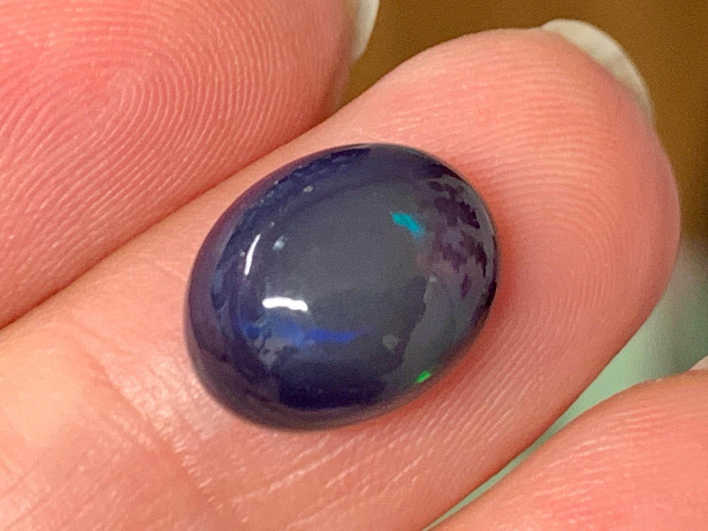 Natural Ethiopian Black Opal 9x12x6mm cabochon