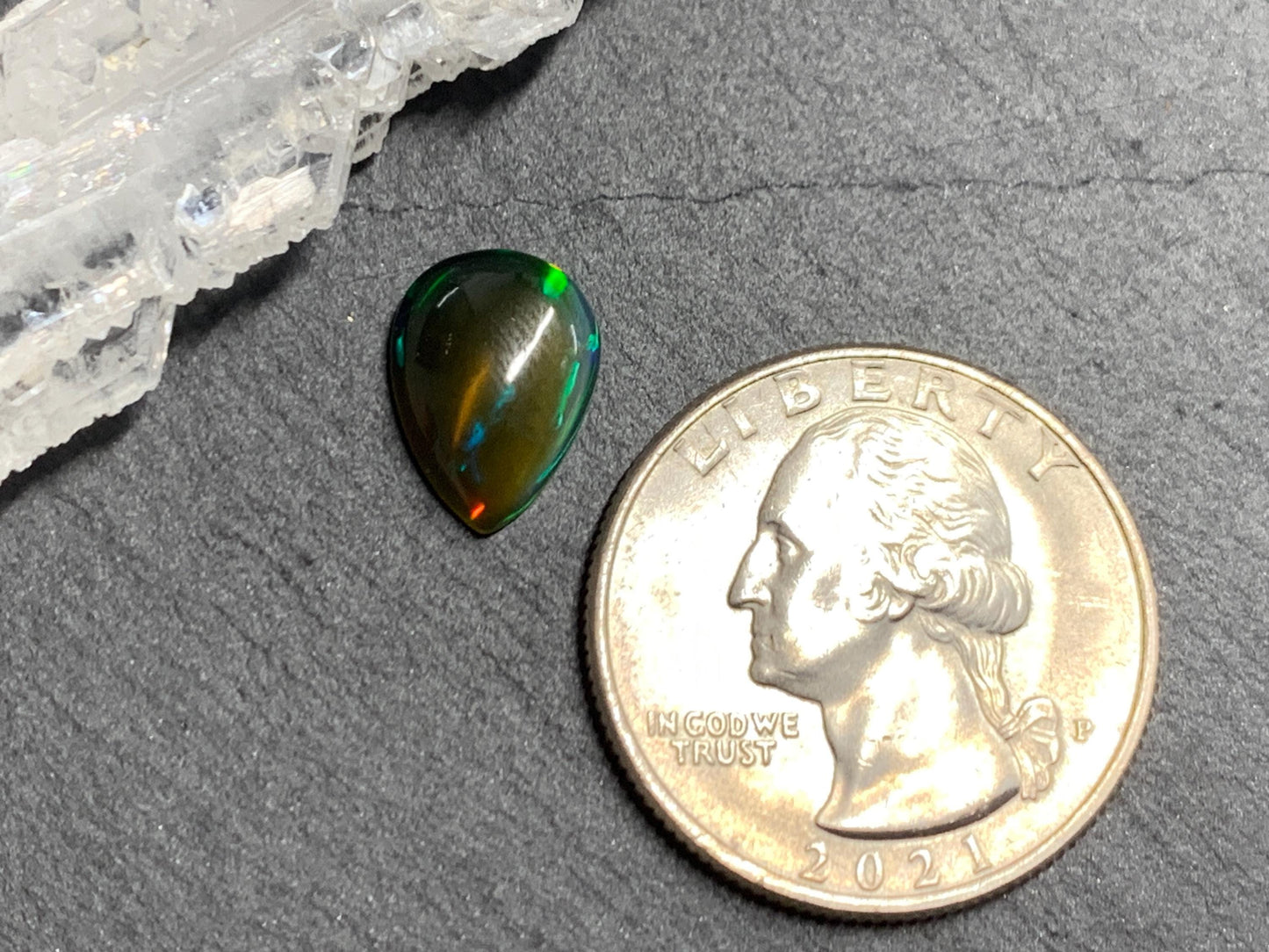 Natural Black Ethiopian Opal pear 9x12x3mm cabochon
