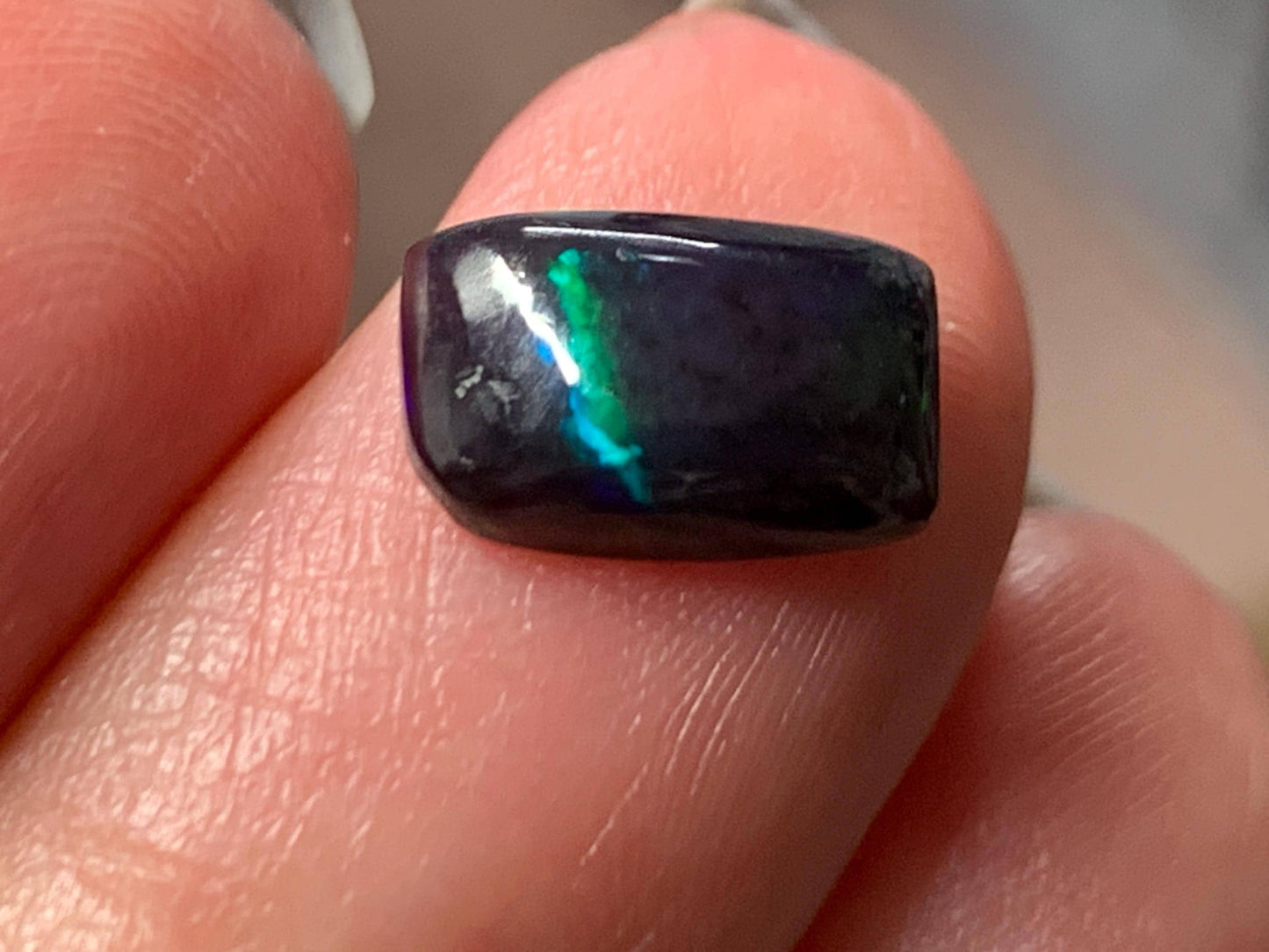 Natural Ethiopian Black Opal 6x10x3mm cabochon