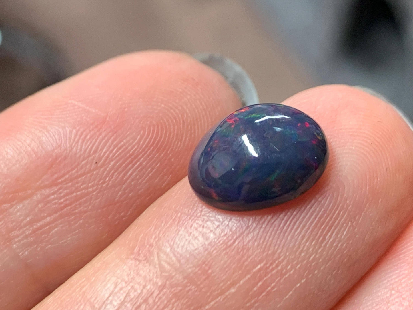 Natural Ethiopian Black Opal 8x11x4mm cabochon