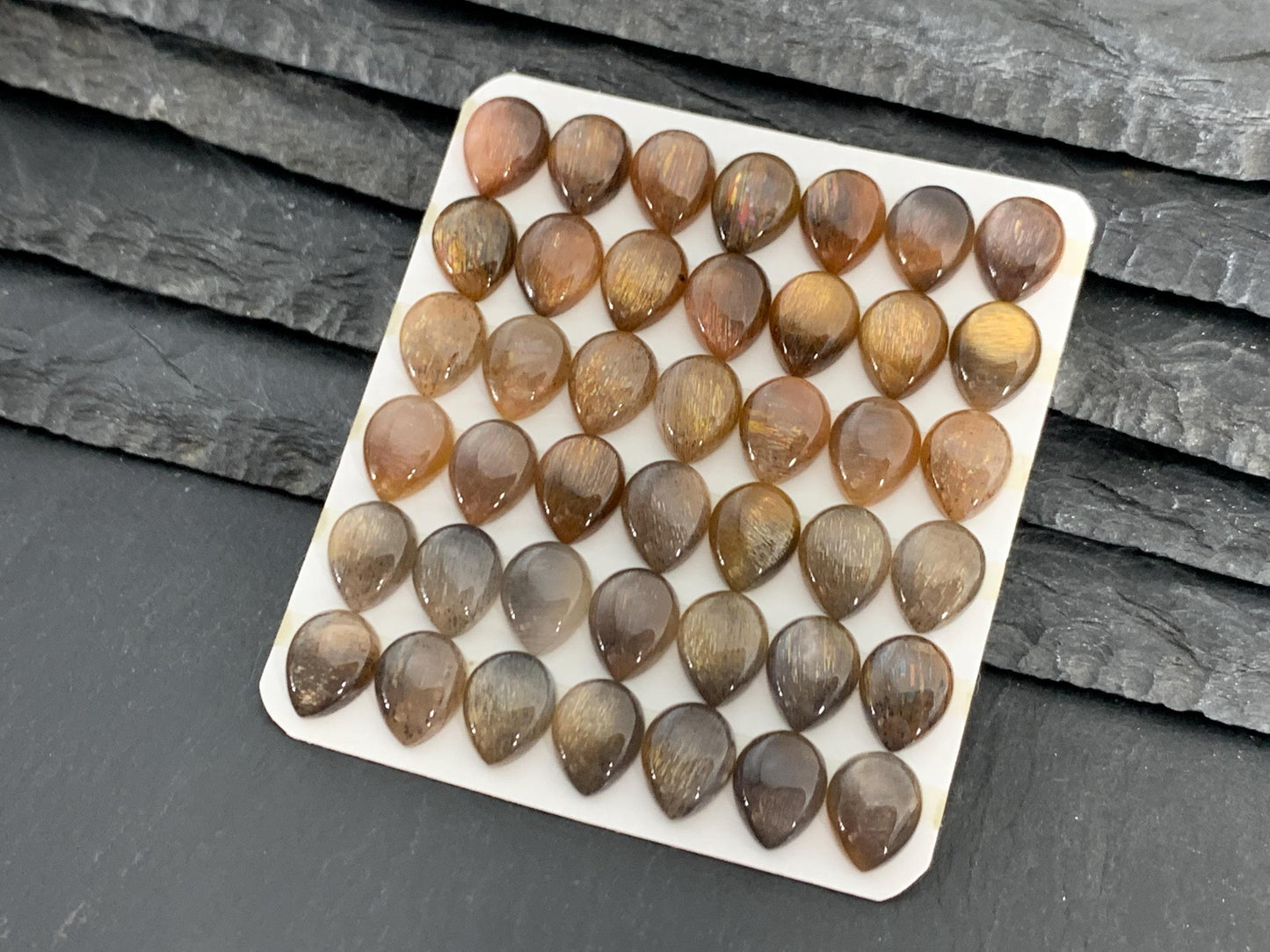 Gold Sunstone pear 8x10mm cabochon