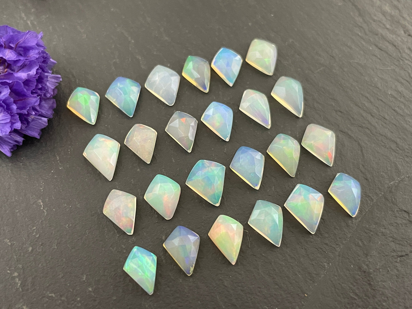 Faceted Ethiopian Opal kite 7-8mm long cabochon