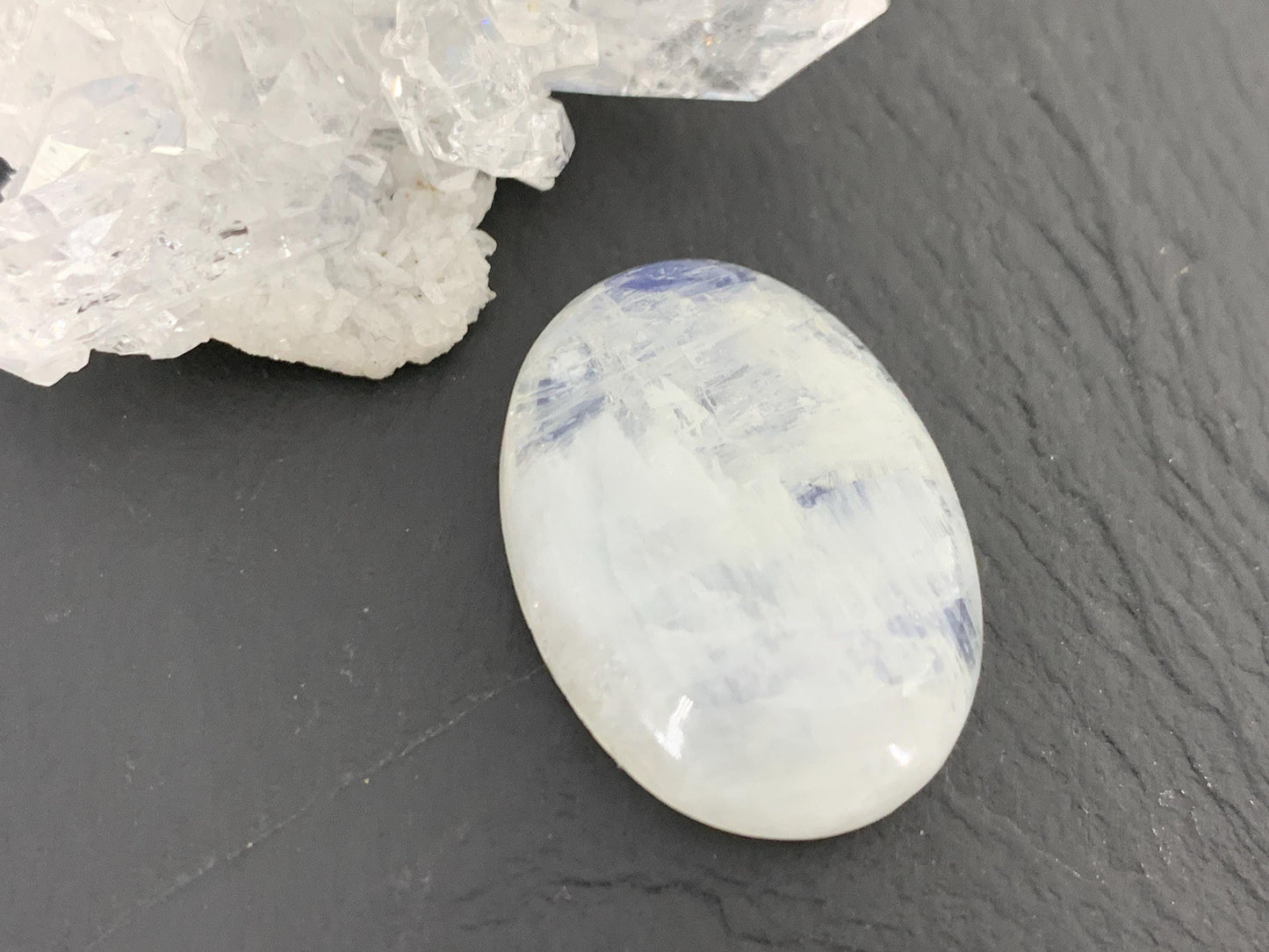 Rainbow Moonstone oval 26x19x7mm cabochon