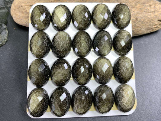 Faceted Gold Obsidian oval 12x16mm cabochon