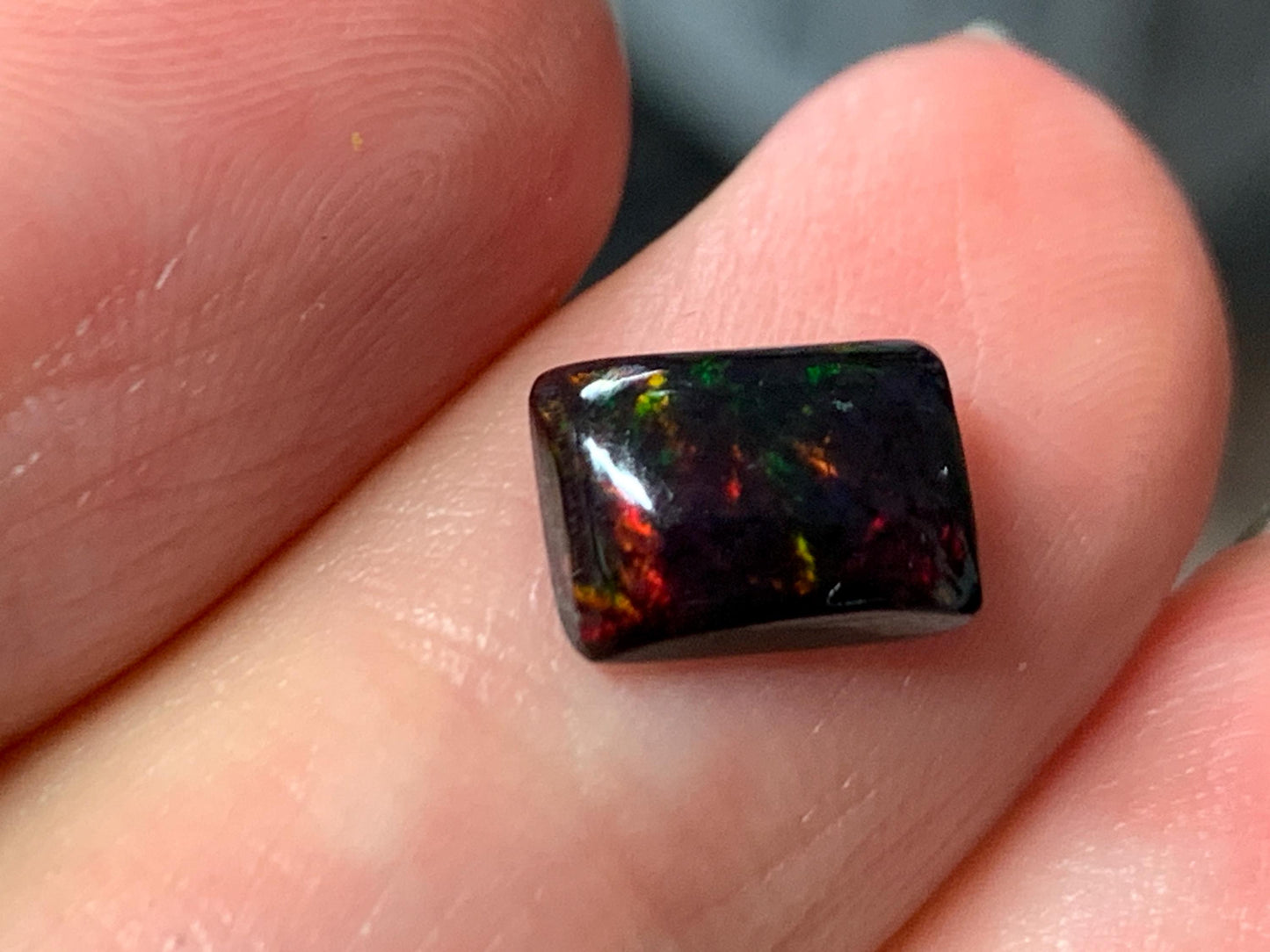 Natural Ethiopian Black Opal 6x8x3mm cabochon