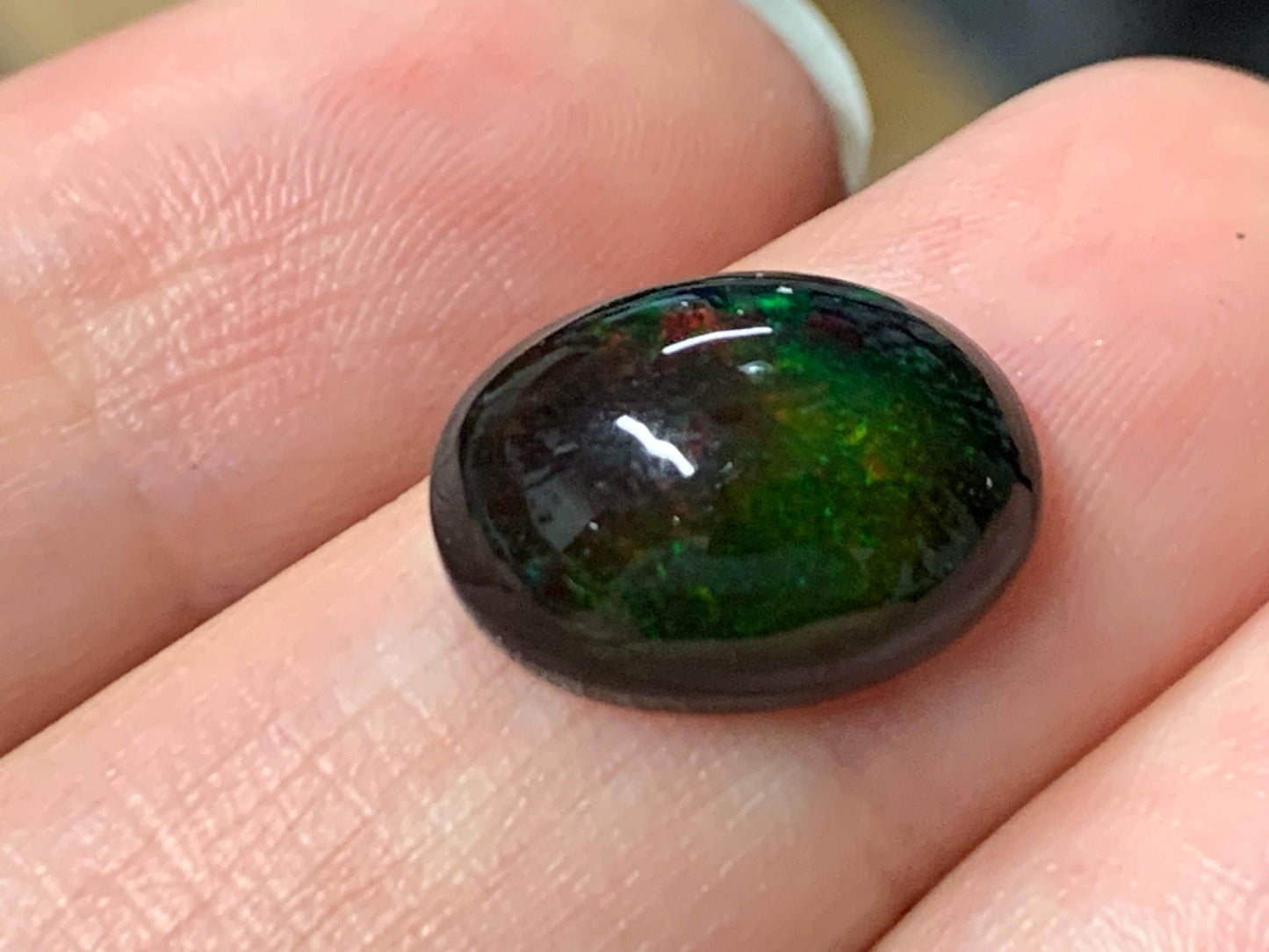 Natural Ethiopian Black Opal 10x14x6mm cabochon